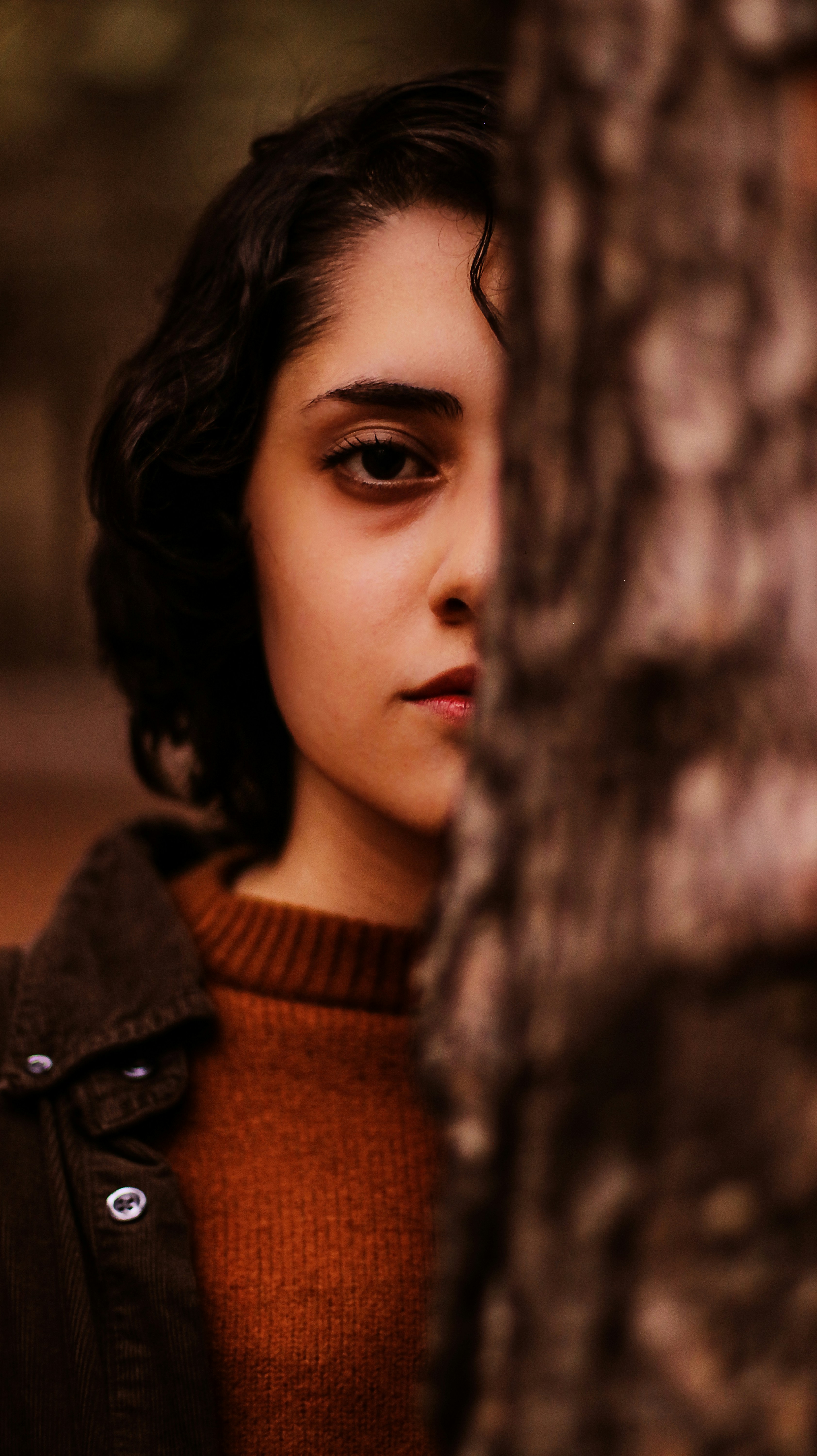 woman in brown knit sweater