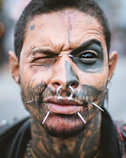 man with silver nose piercing