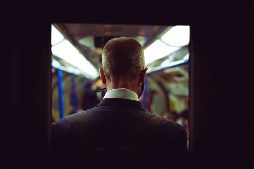 man in black suit jacket