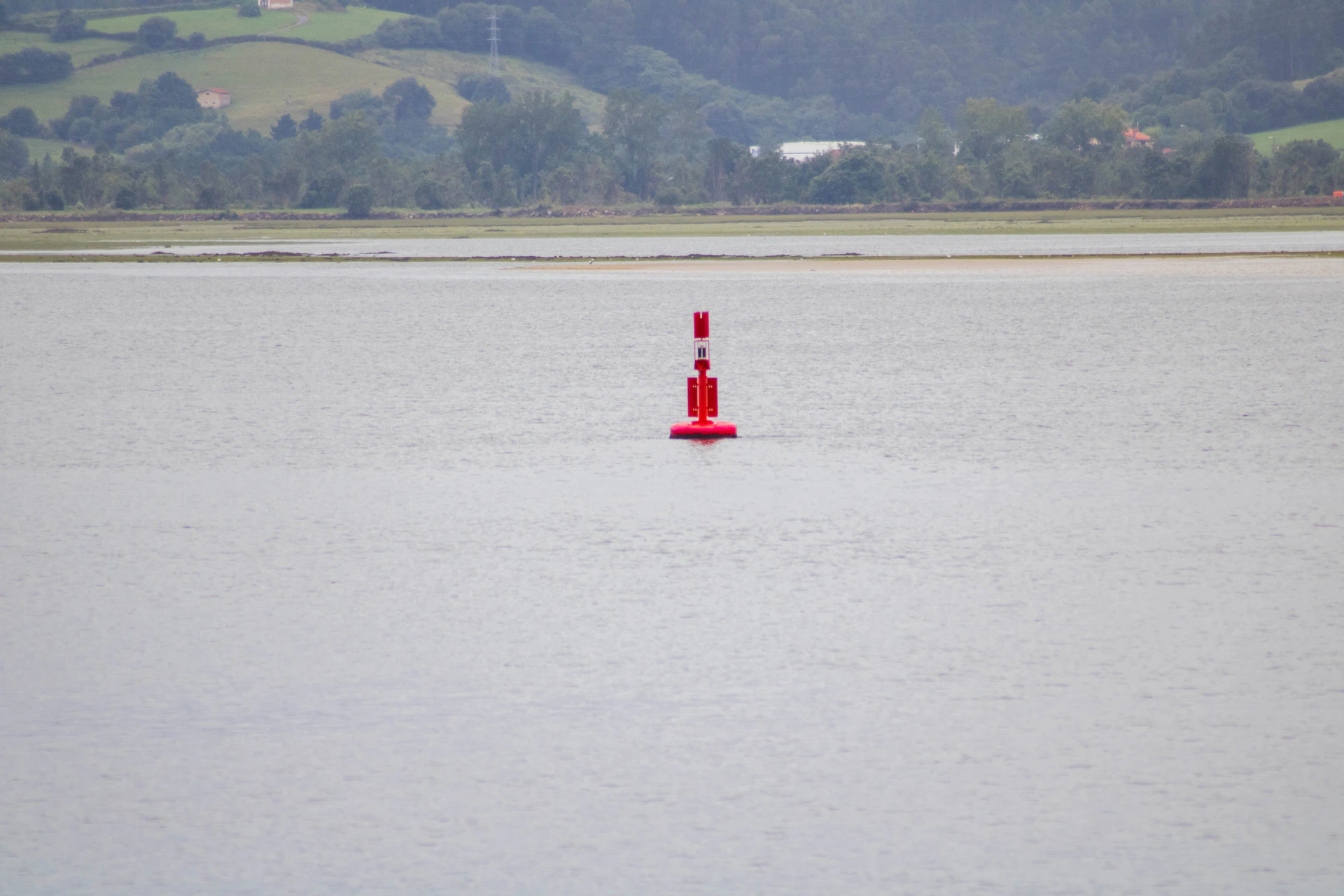 red and white boat on sea during daytime