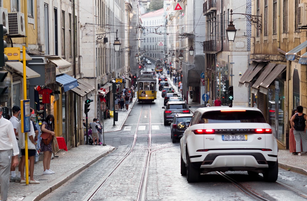 white car on road during daytime