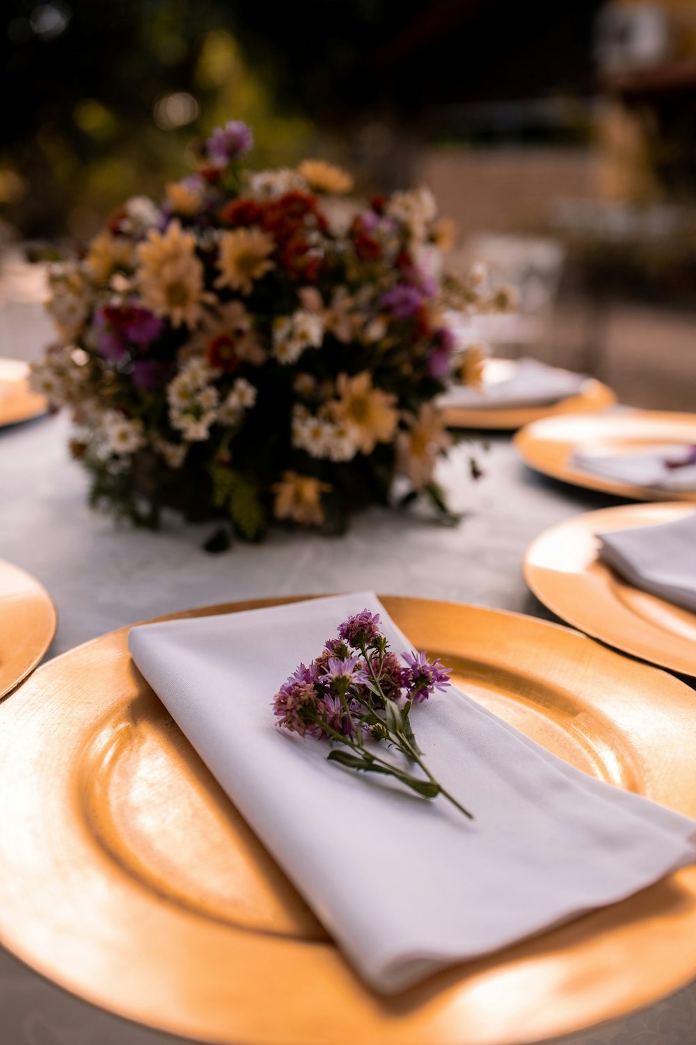 purple flowers on white ceramic plate