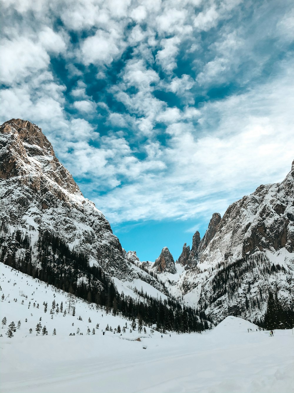 snow covered mountain under blue sky during daytime