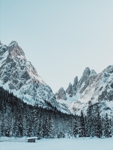 snow covered mountain during daytime
