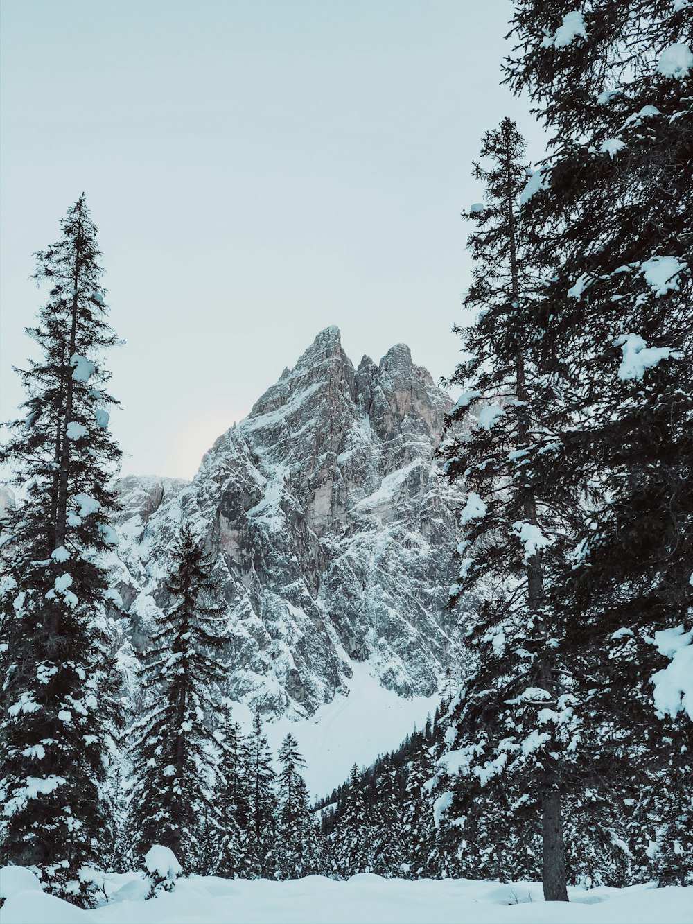 snow covered mountain during daytime