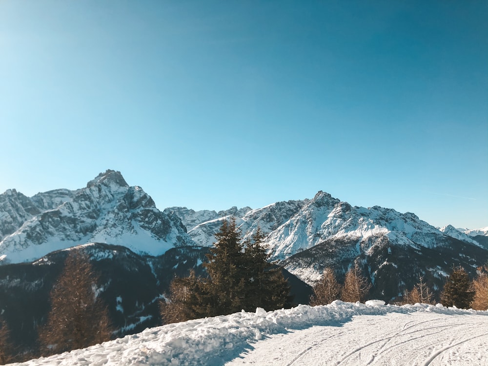 snow covered mountain during daytime