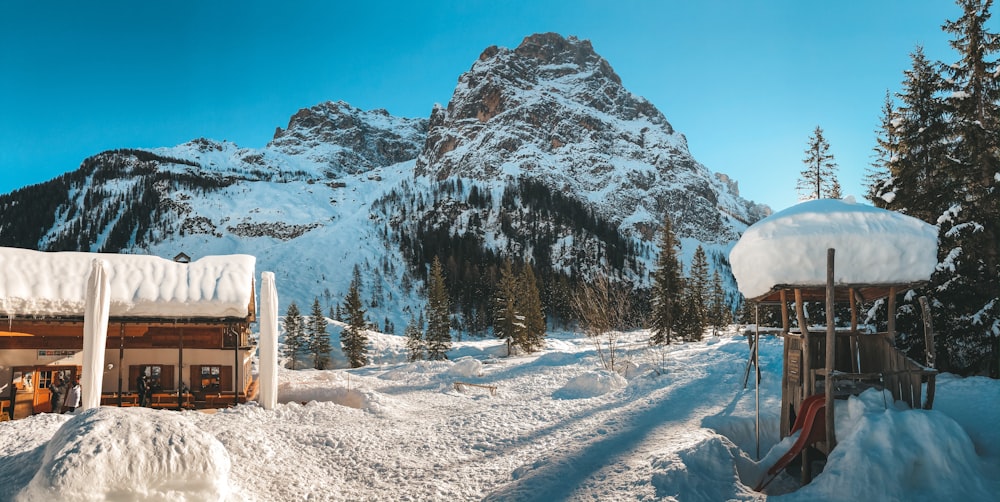 snow covered mountain during daytime