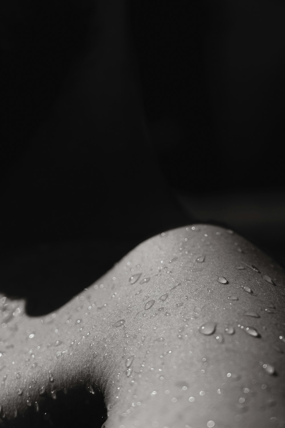 water droplets on gray surface