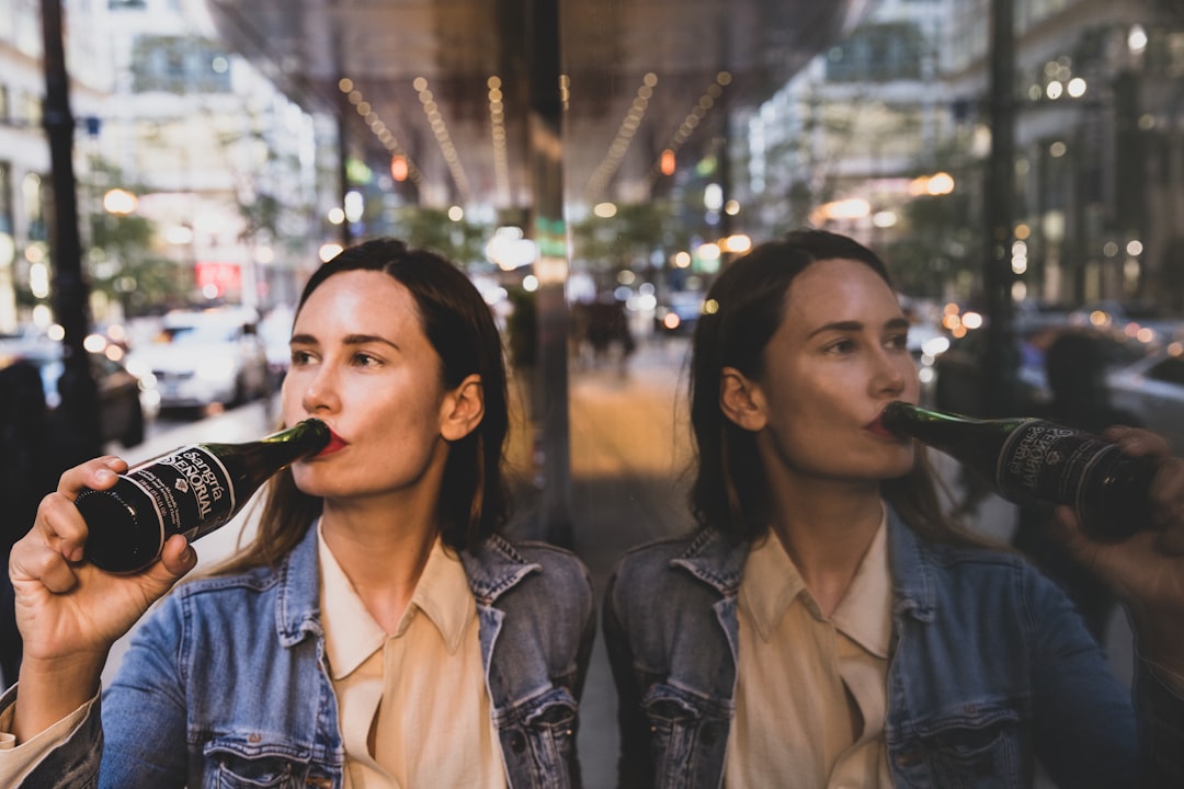 woman in black leather jacket smoking cigarette, Sangria Senorial Bright Lights and Reflections