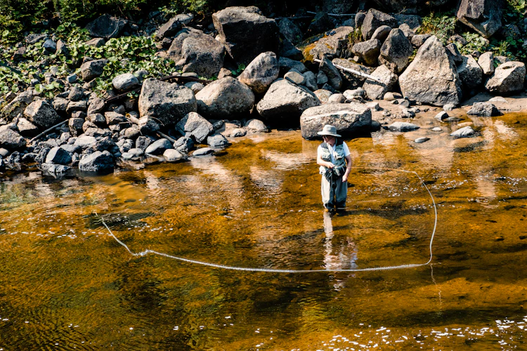 angler fishing on a river