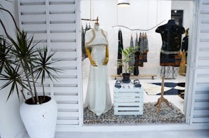 white and gold dress on mannequin