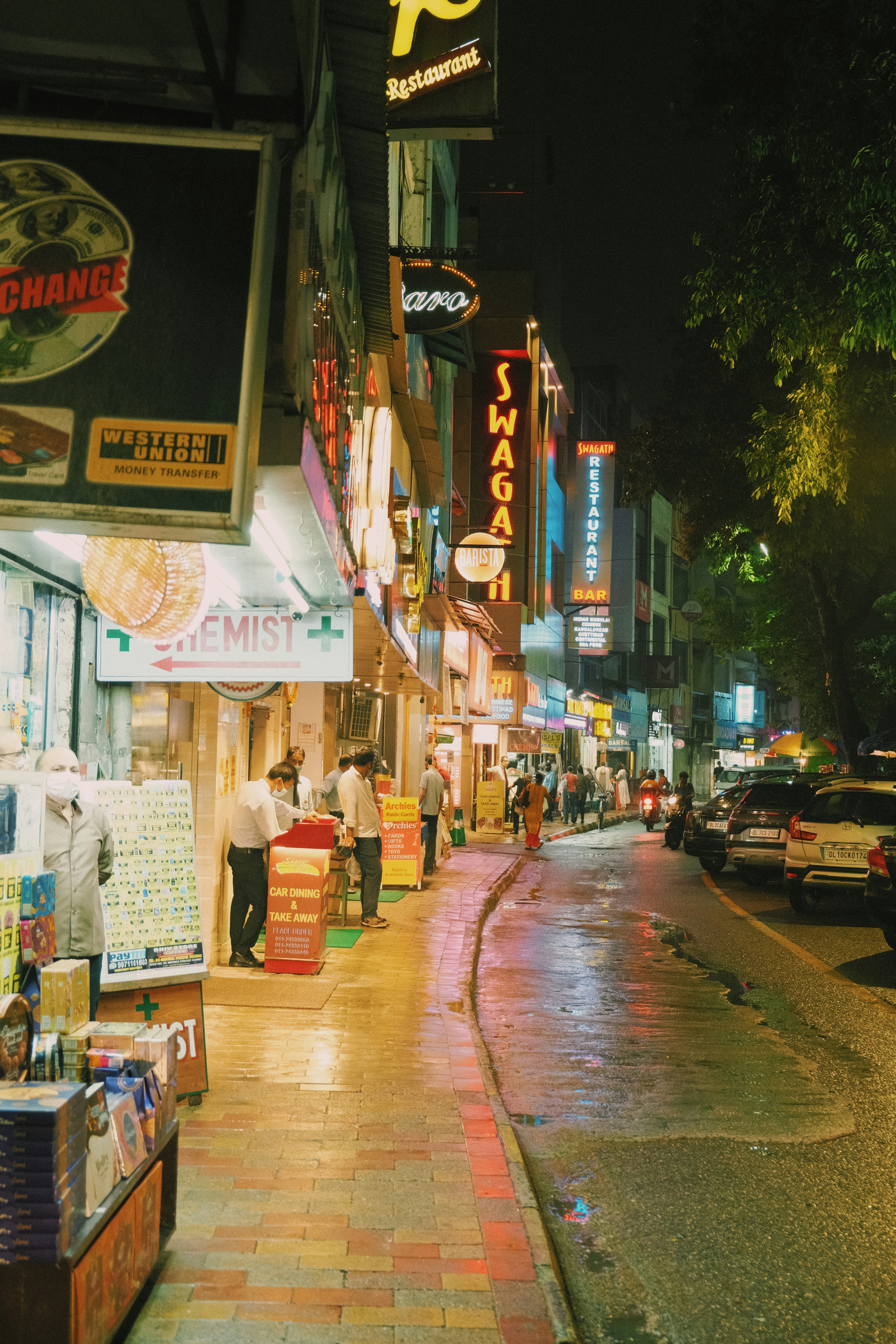 cars parked on street during night time