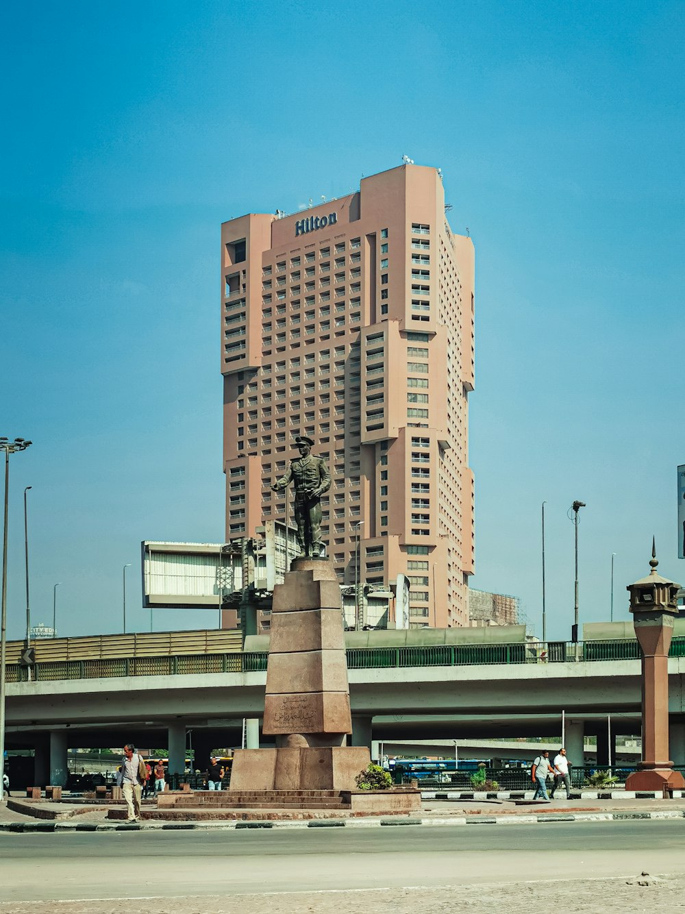 brown concrete building under blue sky during daytime