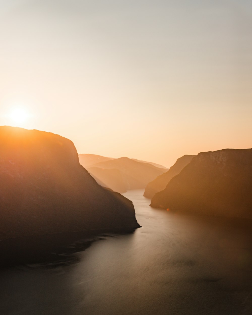 silhouette of mountains during sunset