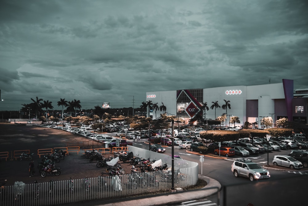 cars parked in front of building during daytime