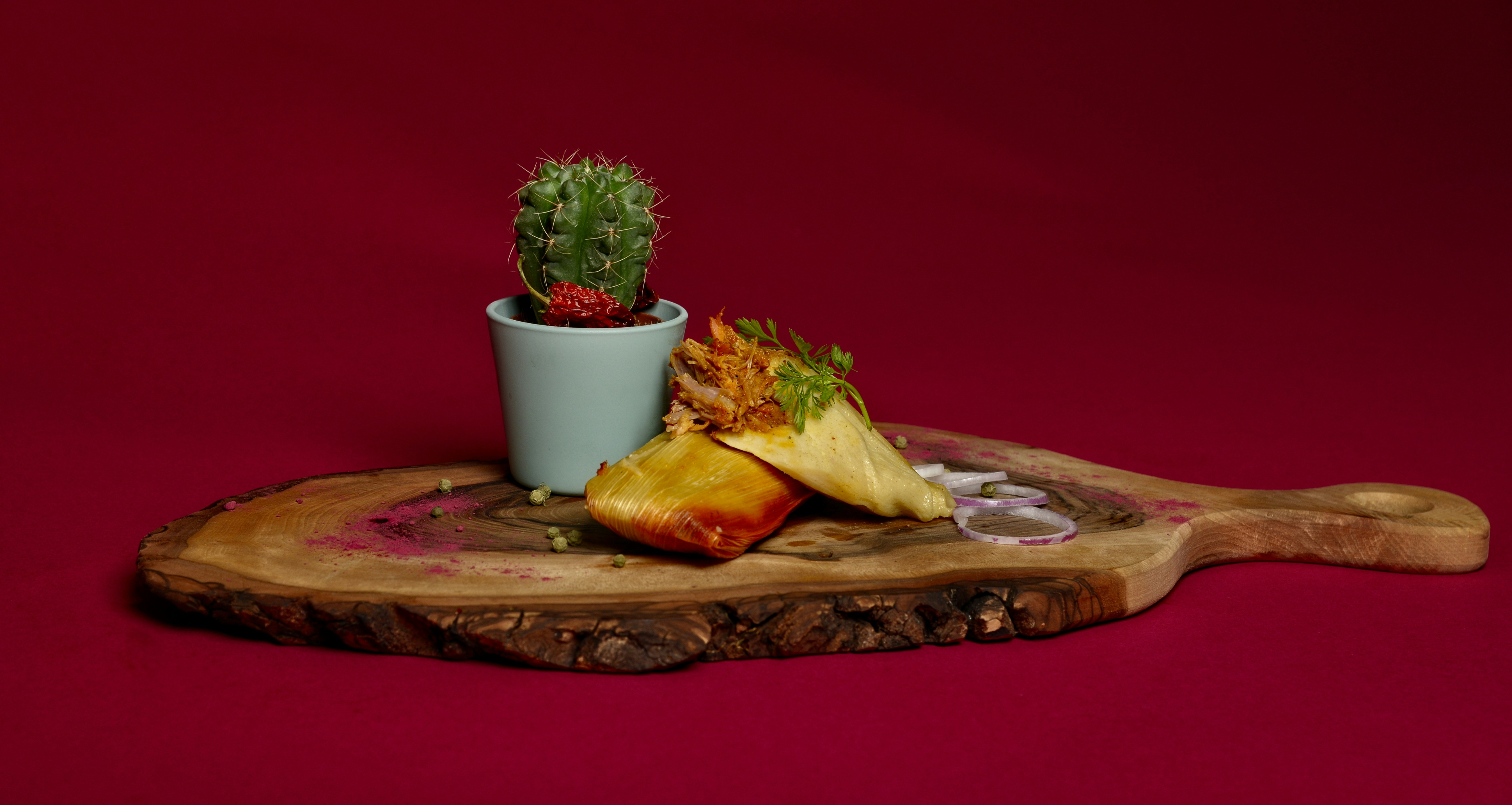 brown and green leaf on brown wooden chopping board