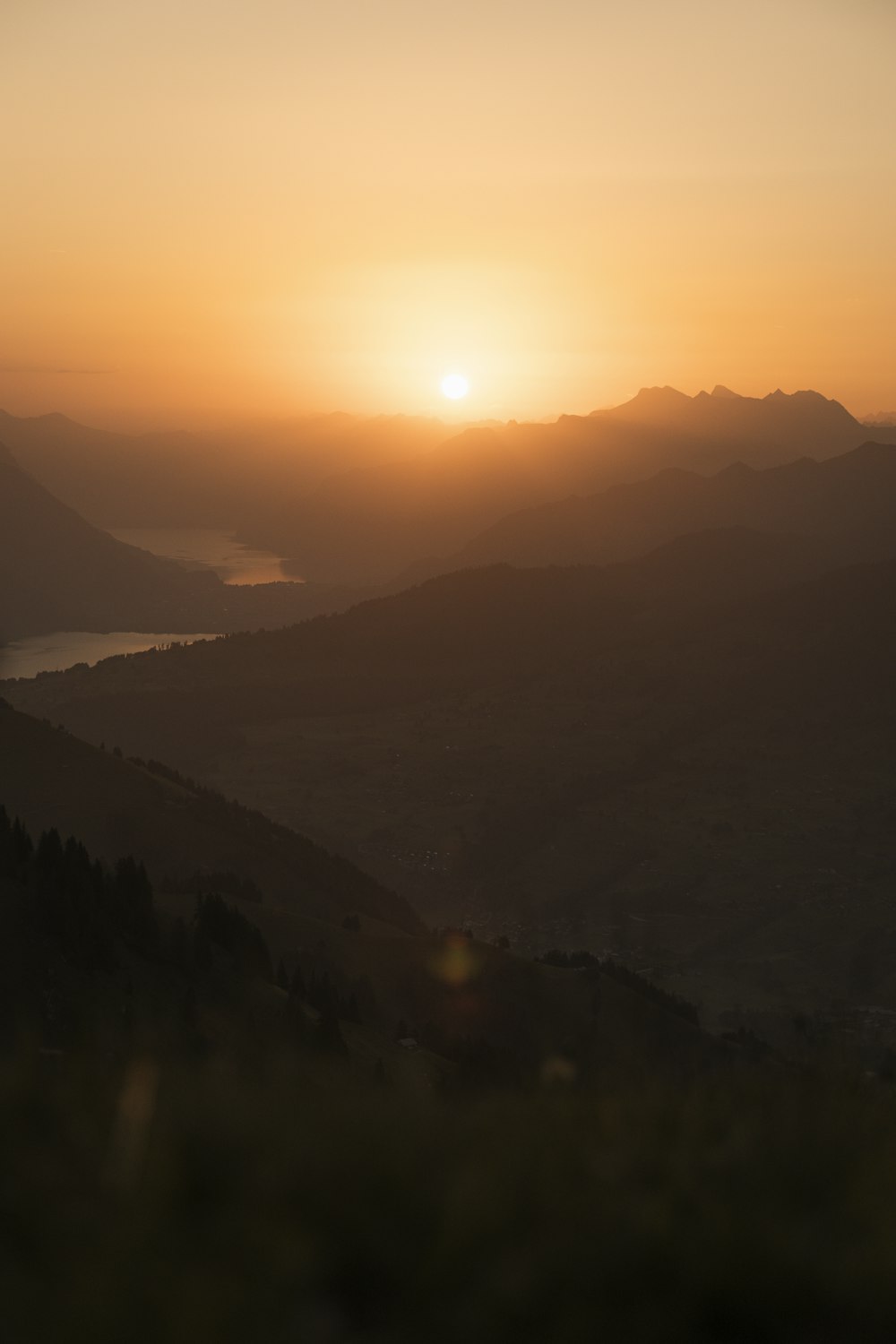 silhouette of mountains during sunset