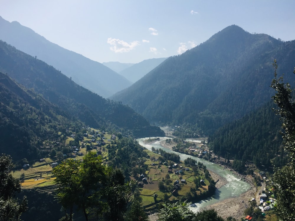 green mountains and trees during daytime