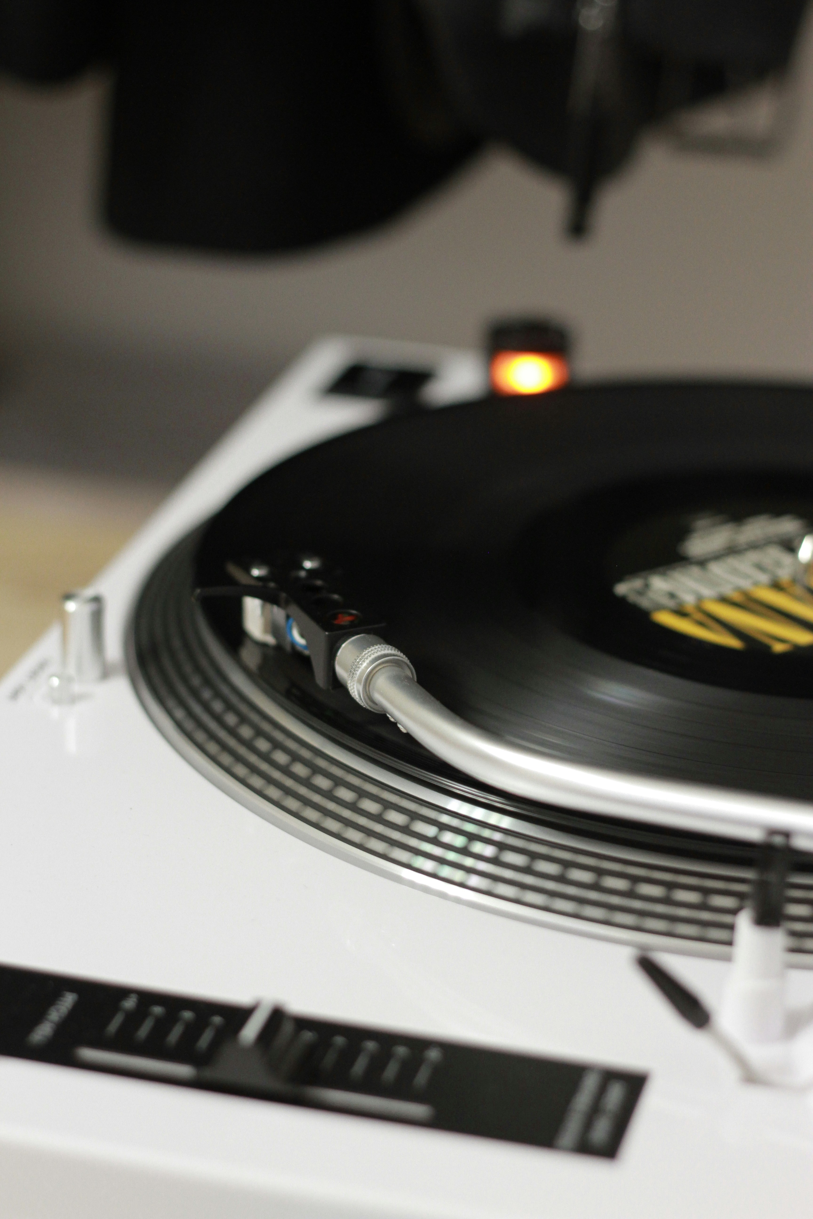 black and silver vinyl record player