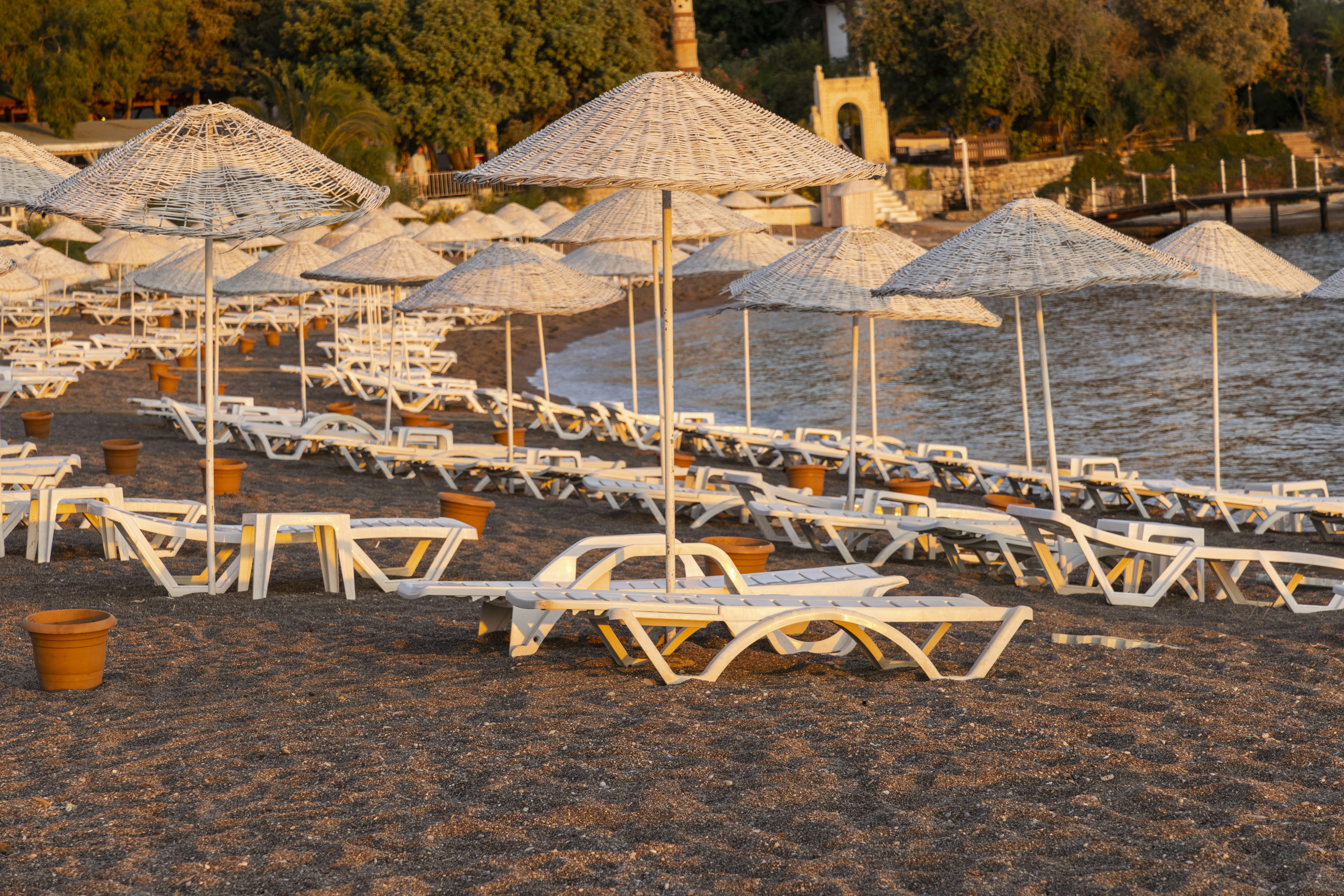 beach of a hotel and sun loungers