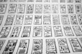 Multiple hand-drawn sketches of mobile user interface designs are spread out in a grid pattern. Each sketch contains various UI elements such as buttons, text boxes, images, and icons.