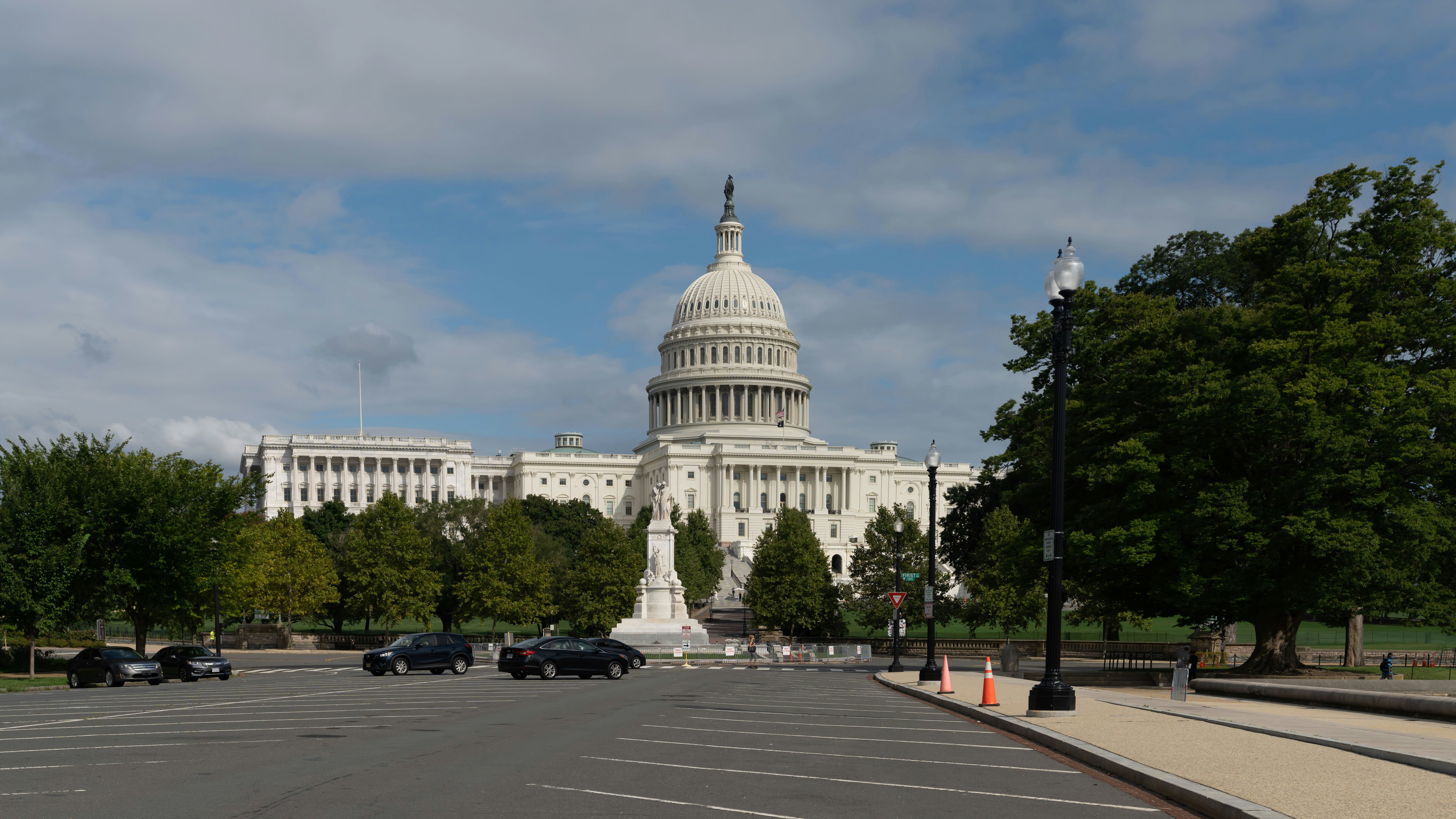 white concrete building under blue sky during daytime