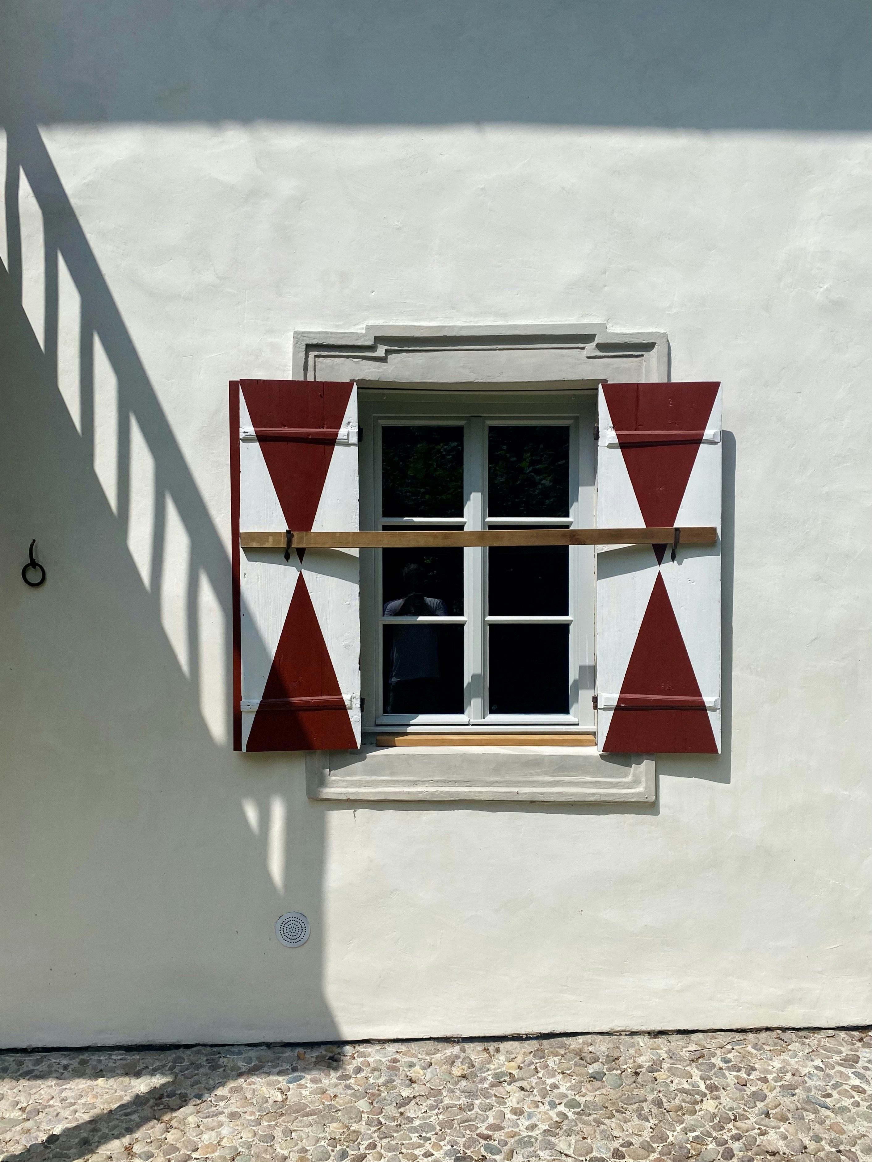 red and white wooden window frame