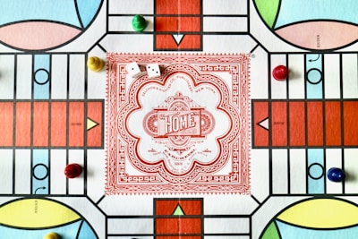 red white and green floral textile
