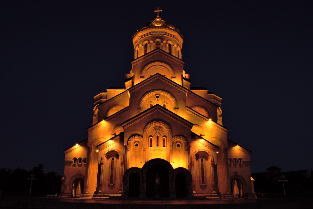 brown concrete building during night time