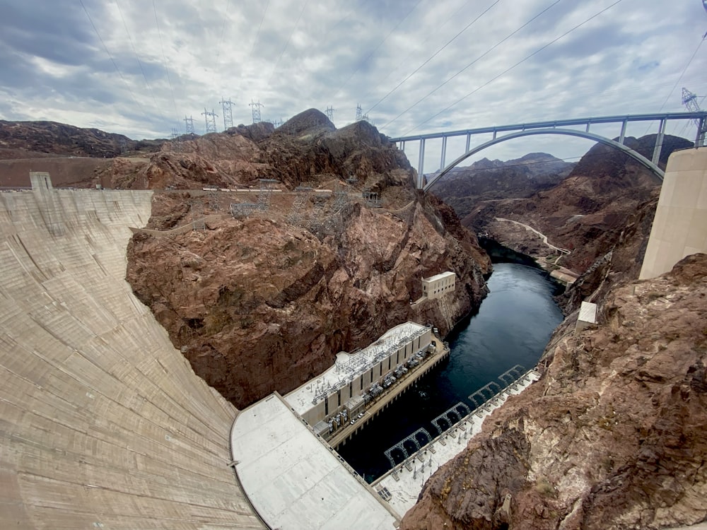 white concrete bridge over river during daytime