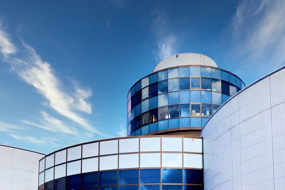 white and blue concrete building under blue sky during daytime