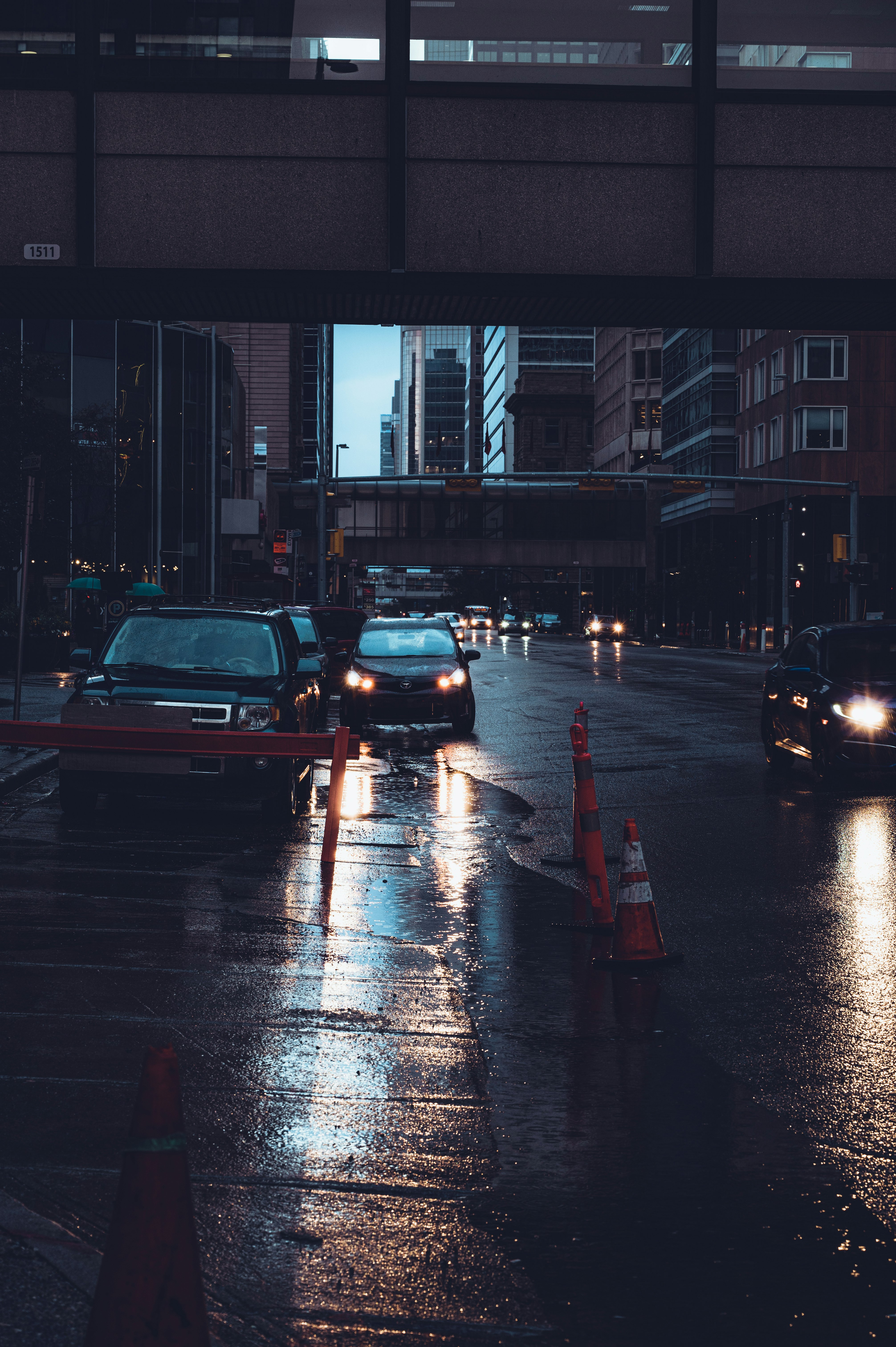 red car on road during night time