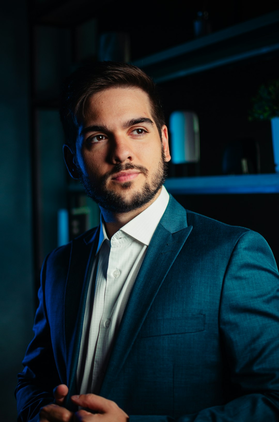 man in blue suit jacket