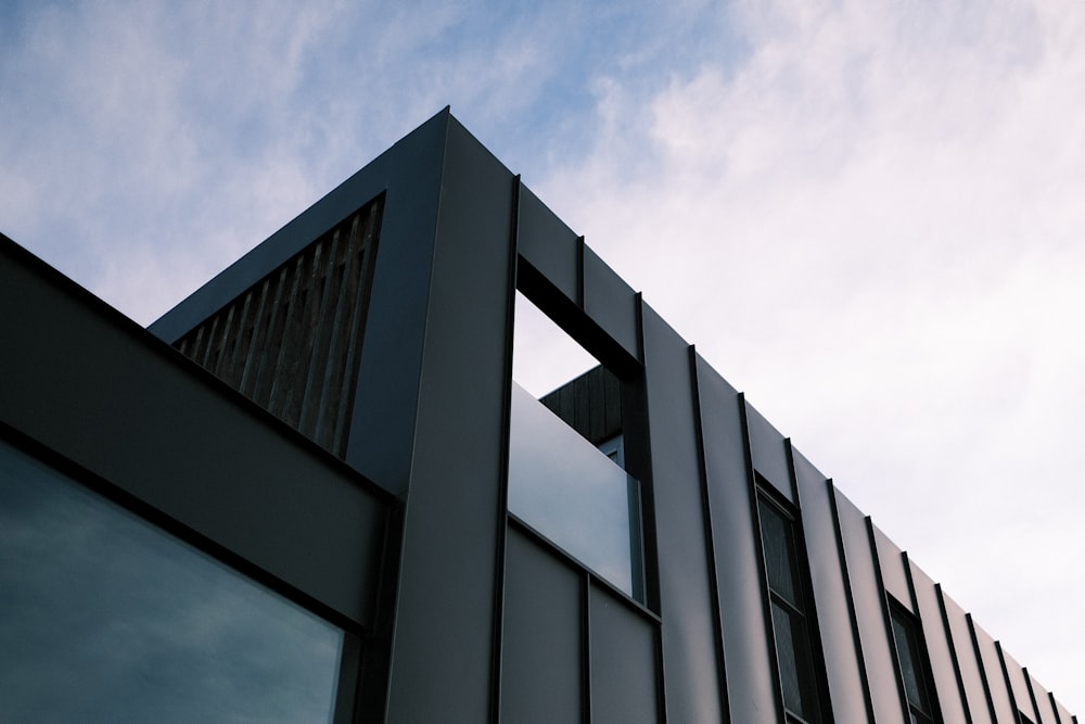 black concrete building under blue sky during daytime