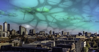 Modern city skyline with digital financial graphs overlay