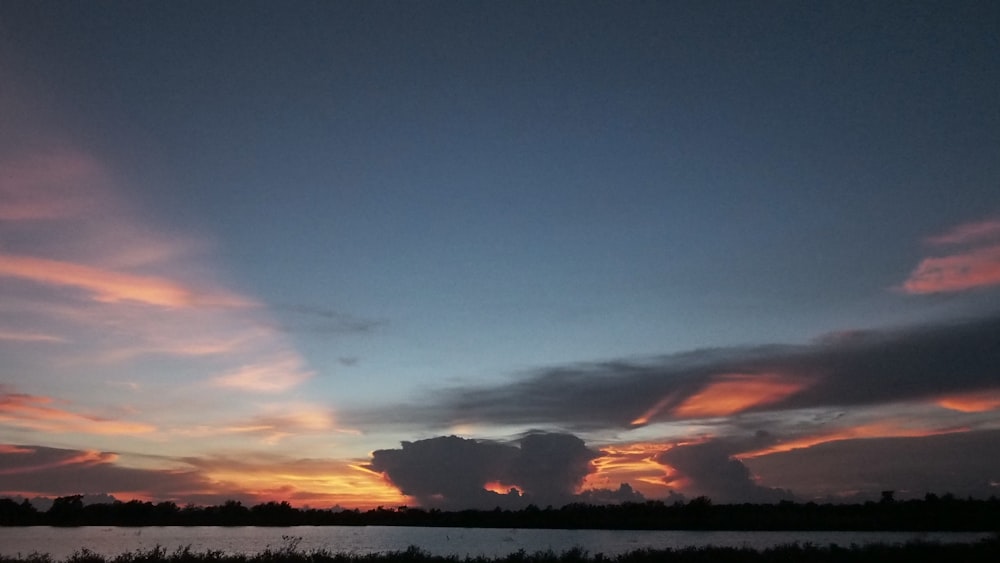 silhouette of mountain during sunset