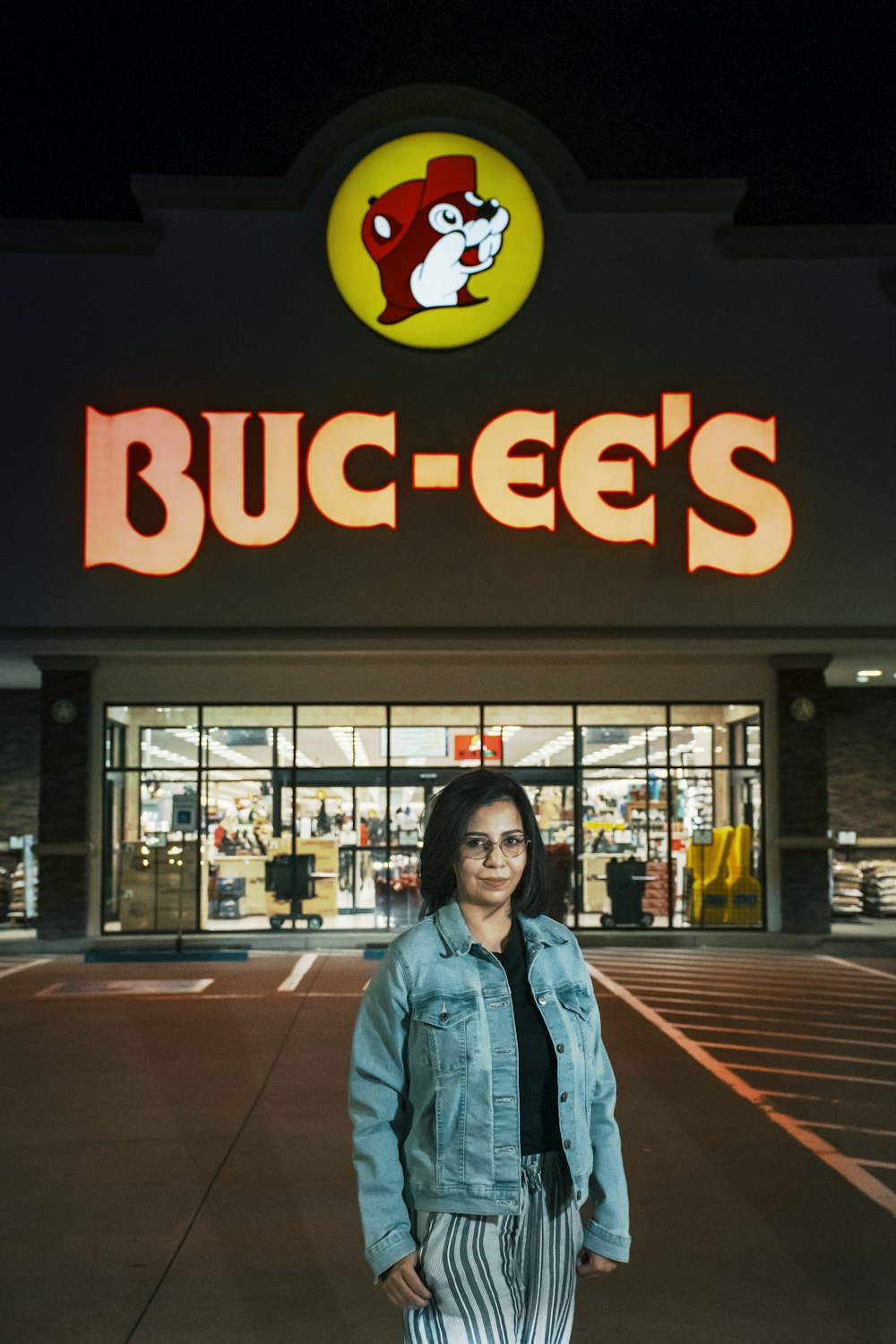 a person standing in front of a store