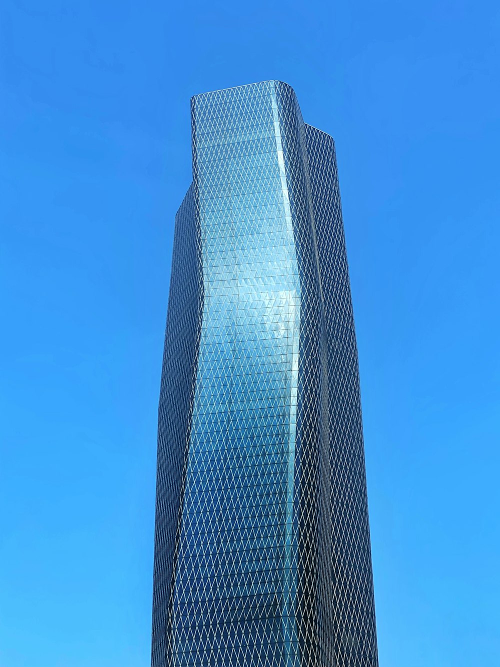 gray concrete building under blue sky during daytime