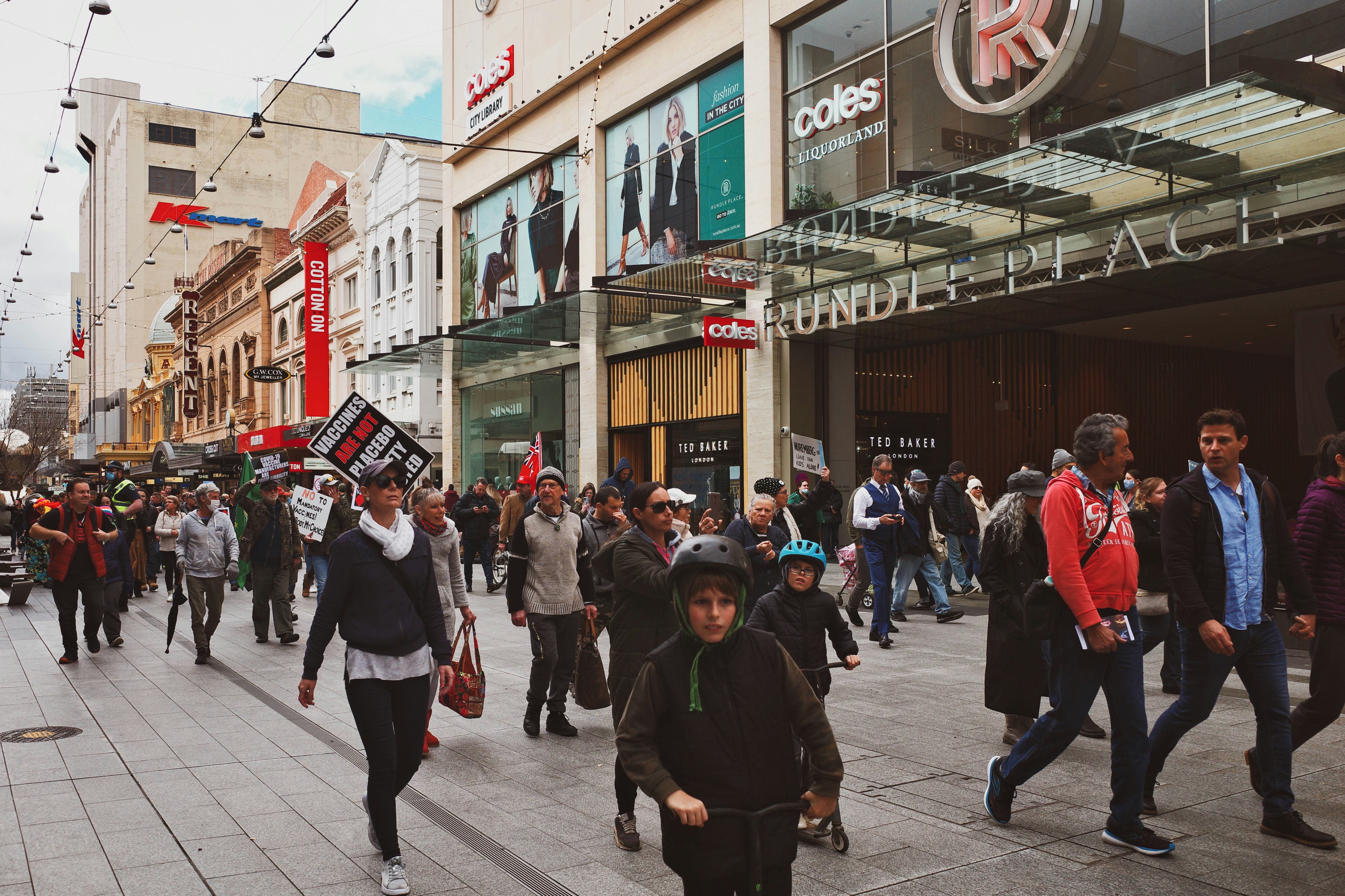 Busy footpath crowd on a city shopping street