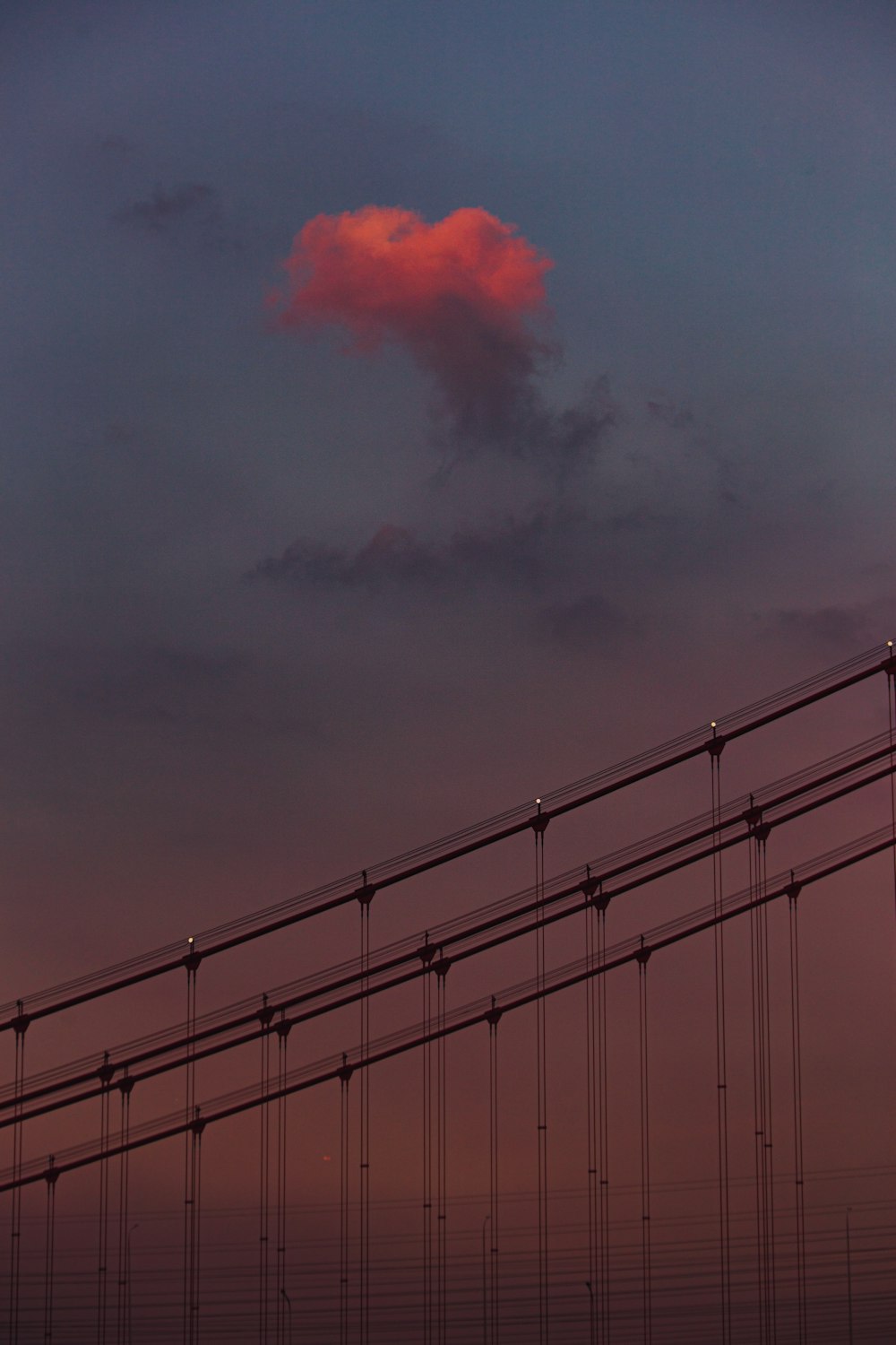 golden gate bridge under cloudy sky