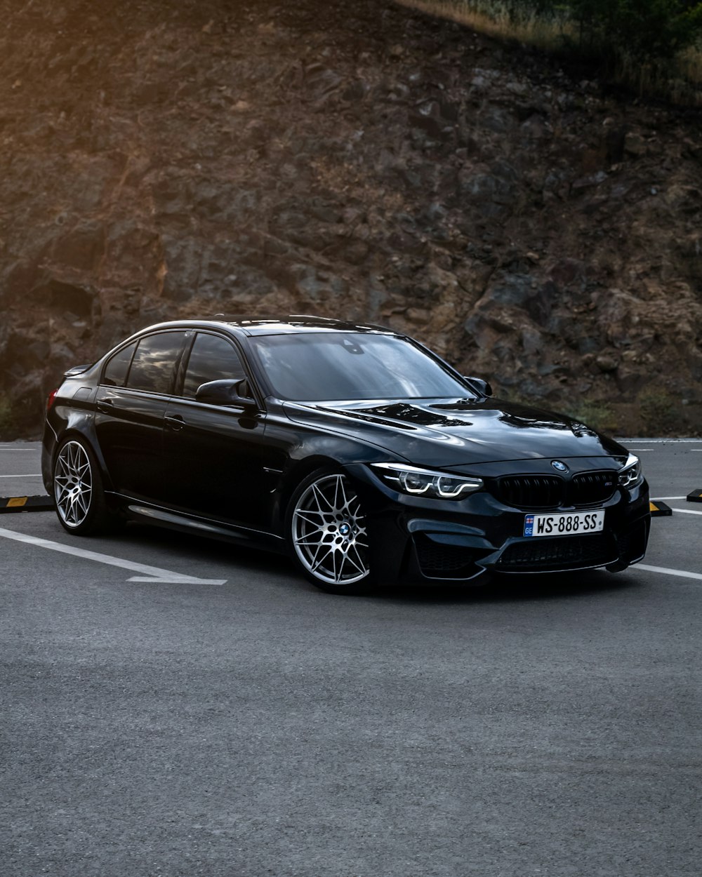 black mercedes benz coupe on road