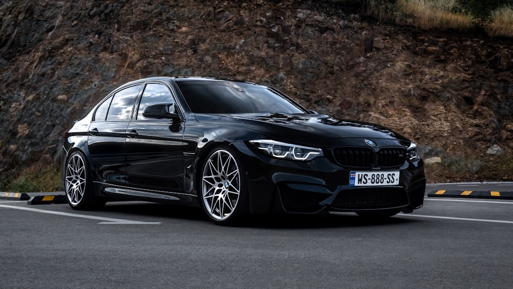 black bmw m 3 coupe on road during daytime