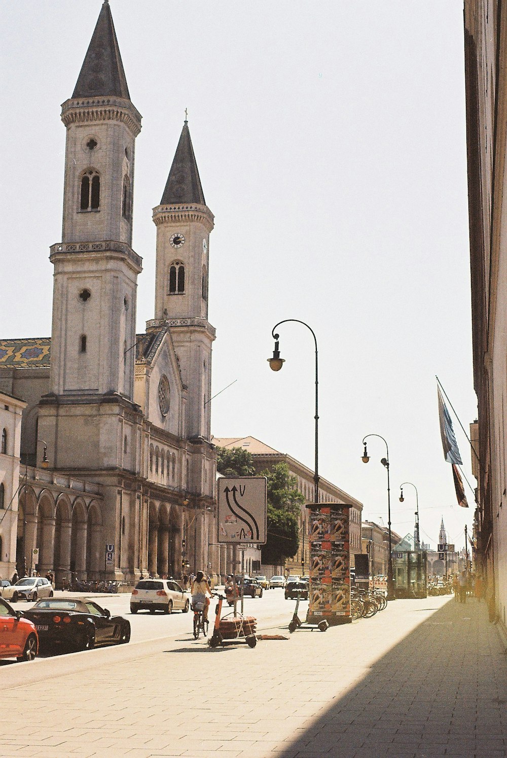 cars parked on street near building during daytime