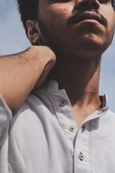 man in white button up shirt