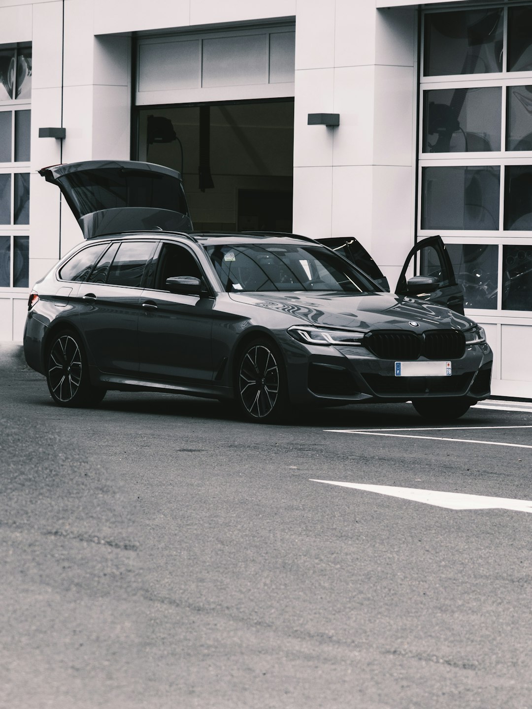 black bmw m 3 coupe parked on parking lot