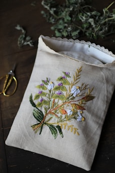 white green and yellow floral textile
