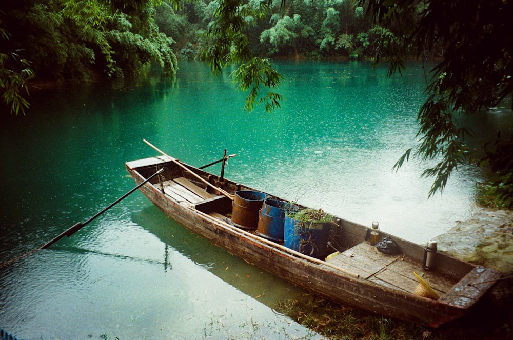 brown wooden boat on water