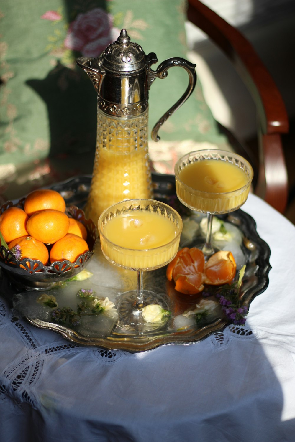 clear glass bottle with yellow liquid inside