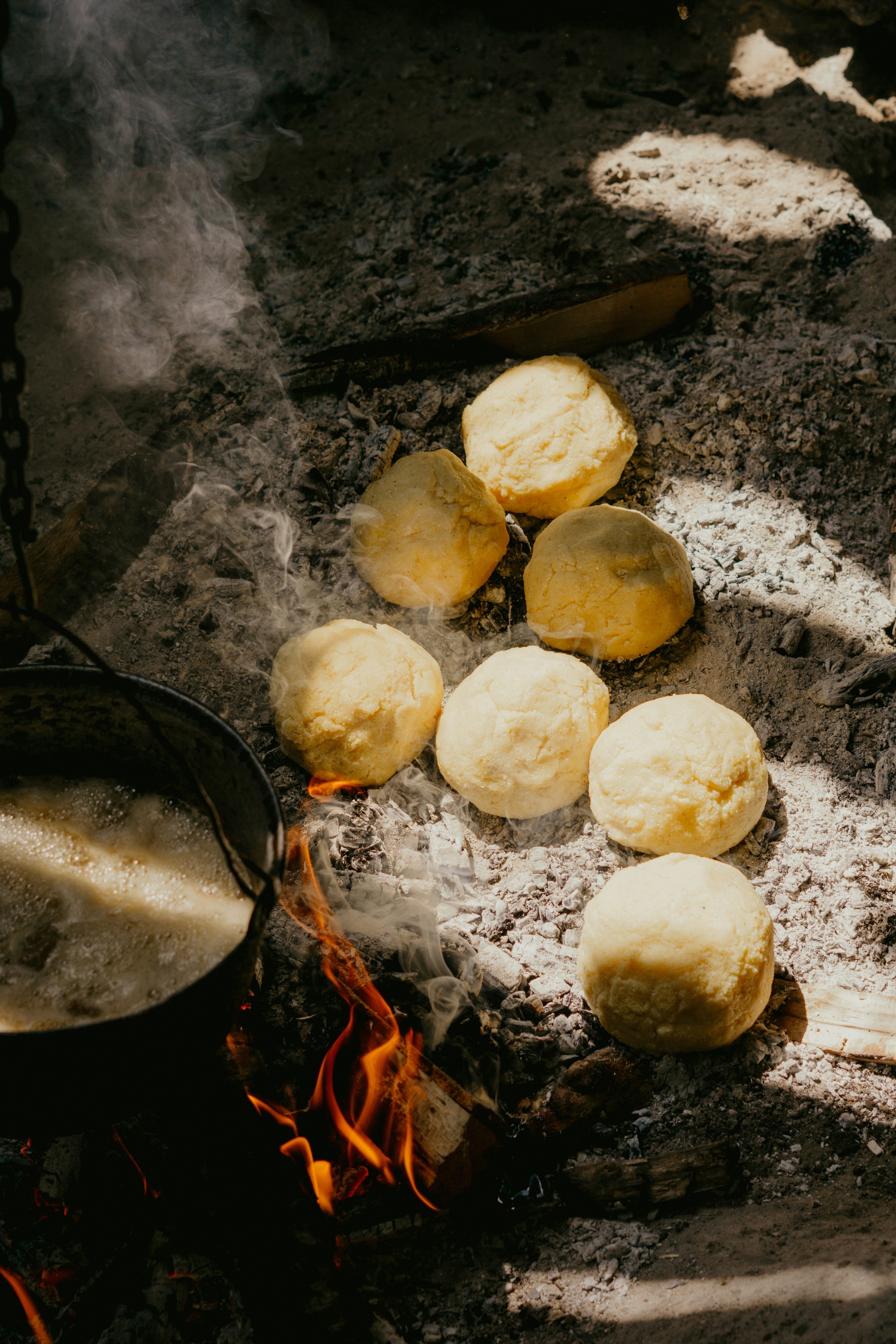 white and brown round fruits on gray surface