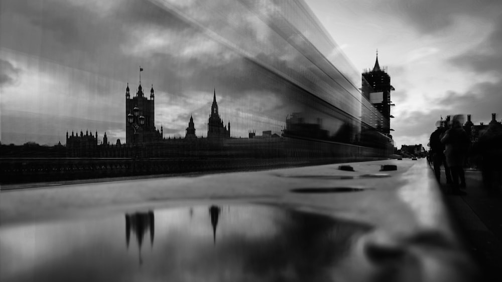 grayscale photo of city buildings